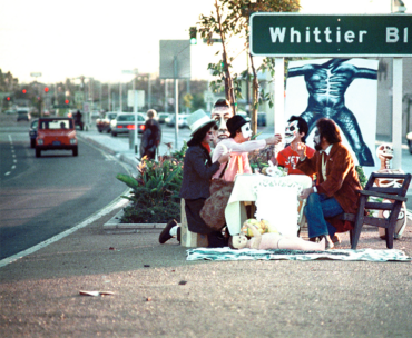 Art collective Asco performs on Whittier Boulevard, where the clash between antiwar protesters and police occurred on the day of the Chicano Moratorium.