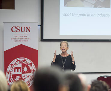 Jane Wurwand giving a presentation on entrepreneurship to CSUN business students.