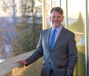 Executive Director Thor Steingraber stands on an outdoor balcony at The Soraya.