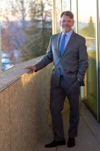 Thor Steingraber stands on the balcony of CSUN's Younes and Soraya Nazarian Center for the Performing Arts.