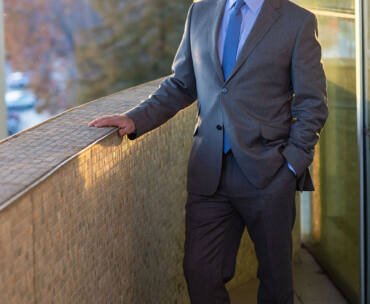 Thor Steingraber stands on the balcony of CSUN's Younes and Soraya Nazarian Center for the Performing Arts.