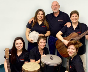 Professor Ron Borczon and the staff of the Music Therapy Wellness Clinic.