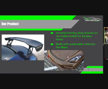 A Zoom presentation where two students show a race car wing.