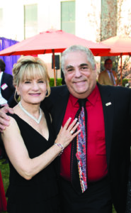 Harriet and Harvey Bookstein standing together outside Bookstein Hall