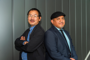 CSUN alumni and photojournalists Ringo Chiu '01 (Special Major - Journalism), left, and Julio Cortez '06 (Journalism) spoke to students about their Pulitzer Prize-winning photographs on Feb. 16. (Photo by DJ Hawking)