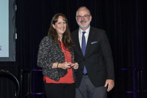Kristina de la Vega standing with Colin Donahue