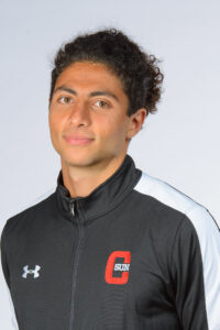 Headshot of Dawoud Mishal in CSUN Track Team uniform.