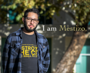 Portrait of Michael Meneses with CSUN building behind him.