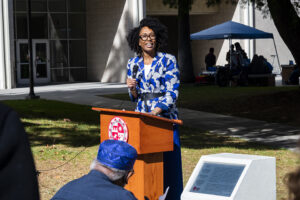 Dr. Marquita Gammage speaks at a podium.