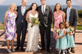 Barbara and Rick Levy (far left) celebrate their daughter's wedding in July, with their family (including their daughters, sons-in law and two granddaughters).