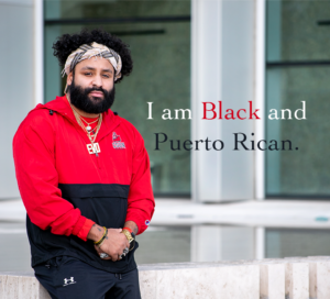 Portrait of student Steve Terrell with the words "I am Black and Puerto Rican" on the image.