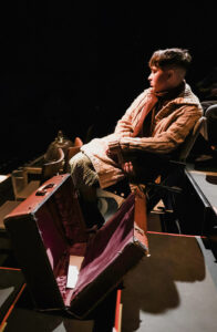 In the CSUN Department of Theatre's fall 2022 production of "The Hatmaker's Wife," the set represented a family's home. When the wife ran away, she sat in the audience and performed there.