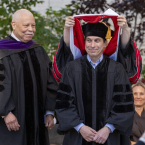 Andrew Anagnost smiles as he receives his honorary doctorate degree