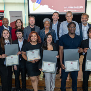 The finalists and judges in the Jeff Marine Bull Ring pose for a group photo.