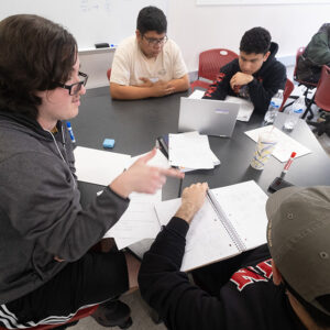 CSUN students study at a table in a math tutoring center.
