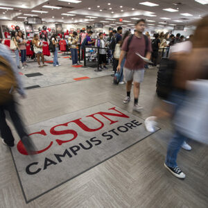 Students walk through The Campus Store.