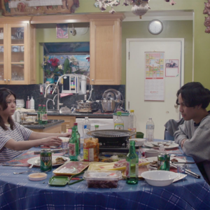 Director Jerome Mariategue sitting at a dinner table with his friends.