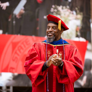 Prof. Boris Ricks in a cap and gown at CSUN commencement