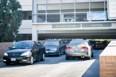Cars leaving and entering the G3 parking structure.