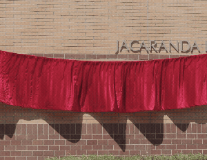 Curtain dropping outside of the Andrew J. Anagnost College of Engineering and Computer Science at California State University, Northridge during the renaming of the college.