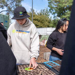 Volunteers prepare to plant seeds in the CSUN G.A.R.D.E.N.