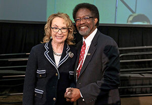Former Congresswoman Gabby Giffords poses for a photo with William Watkins, vice president for Student Affairs and dean of students