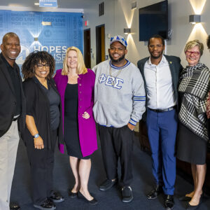 CSUN President Erika D. Beck poses with cabinet members, staff and Senior Pastor Charles Humphrey Jr.,