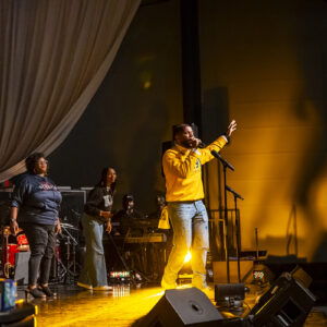 The Praise Team members sing at H.O.P.E.'s House.