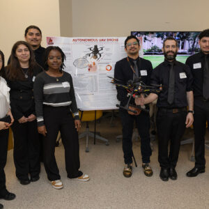 The engineering team with their drone.