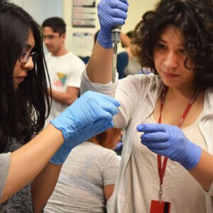 a student doing a science experiment