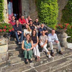 Peter Edmunds and his colleagues on the steps of Chateau de la Bretesche