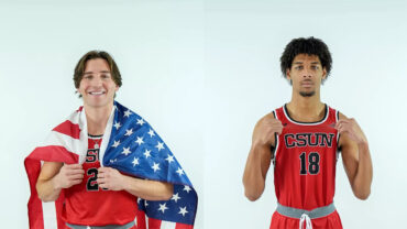 CSUN volleyball players Donovan Constable (wearing an American flag cape) and Jalen Phillips.