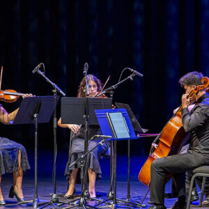 String quartet members play on stage at The Soraya.