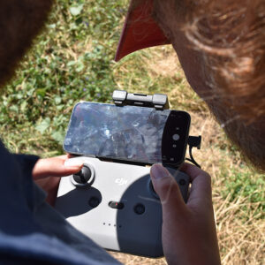 Examining footage from a drone.