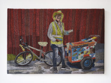 Polyester thread on denim, artwork showing palaterio man by Erick Medel.