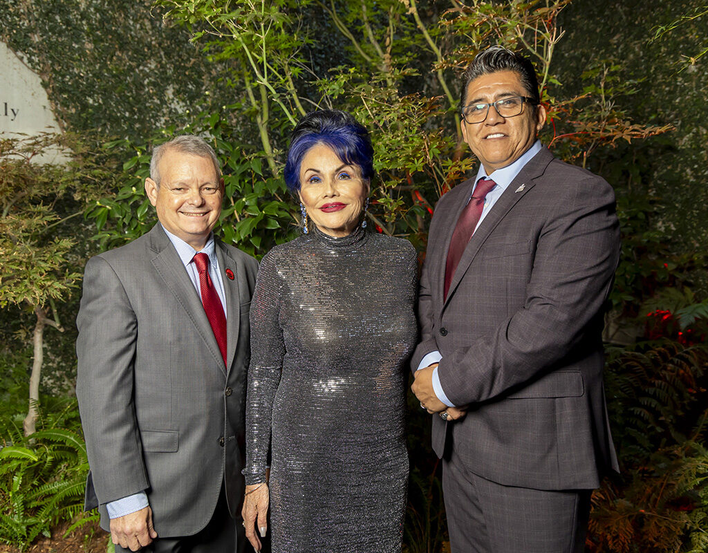 The Three 2025 Distinguished Alumni Award Honorees pose together for a photo.