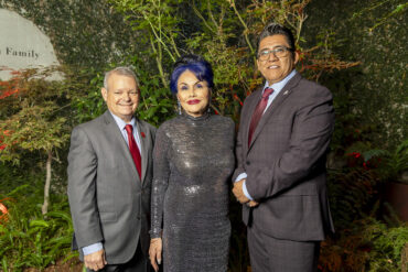 The Three 2025 Distinguished Alumni Award Honorees pose together for a photo.