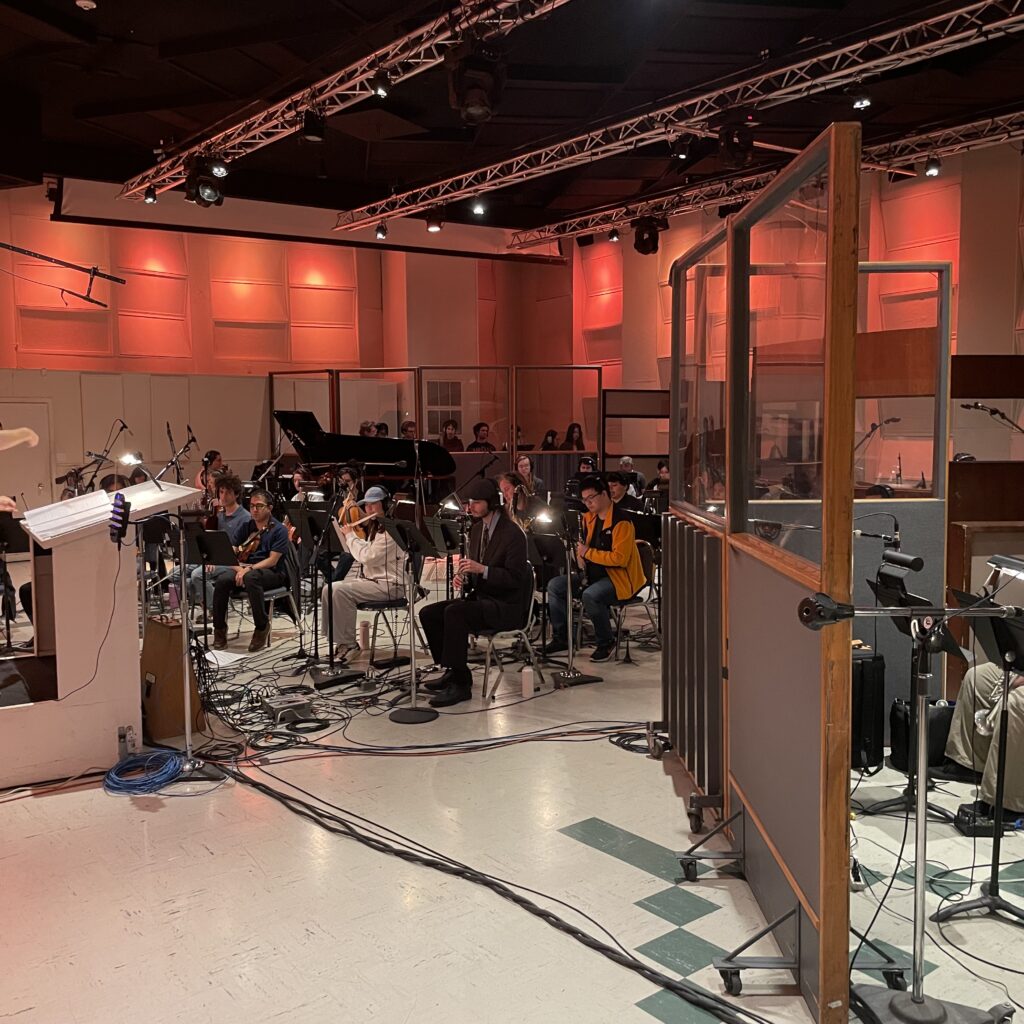 Student musicians recording music.