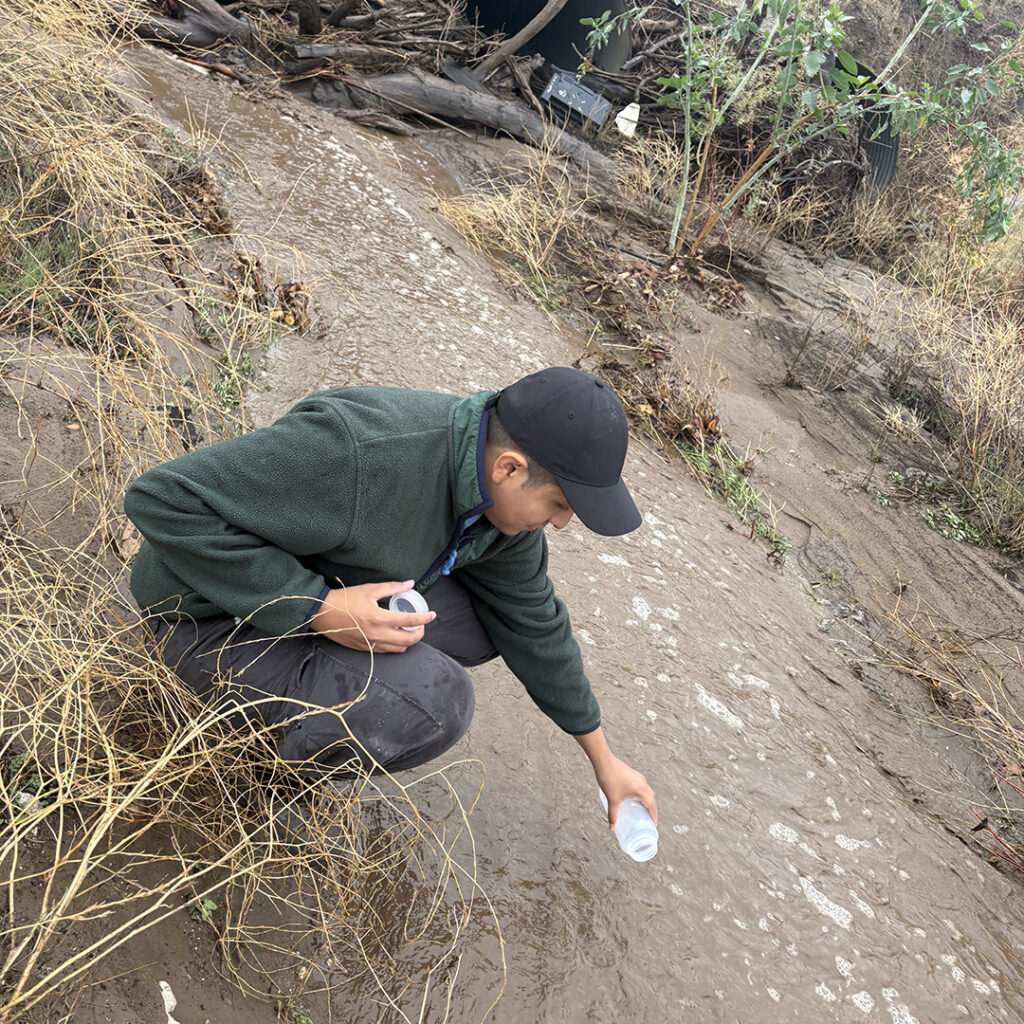 Student collecting water samples