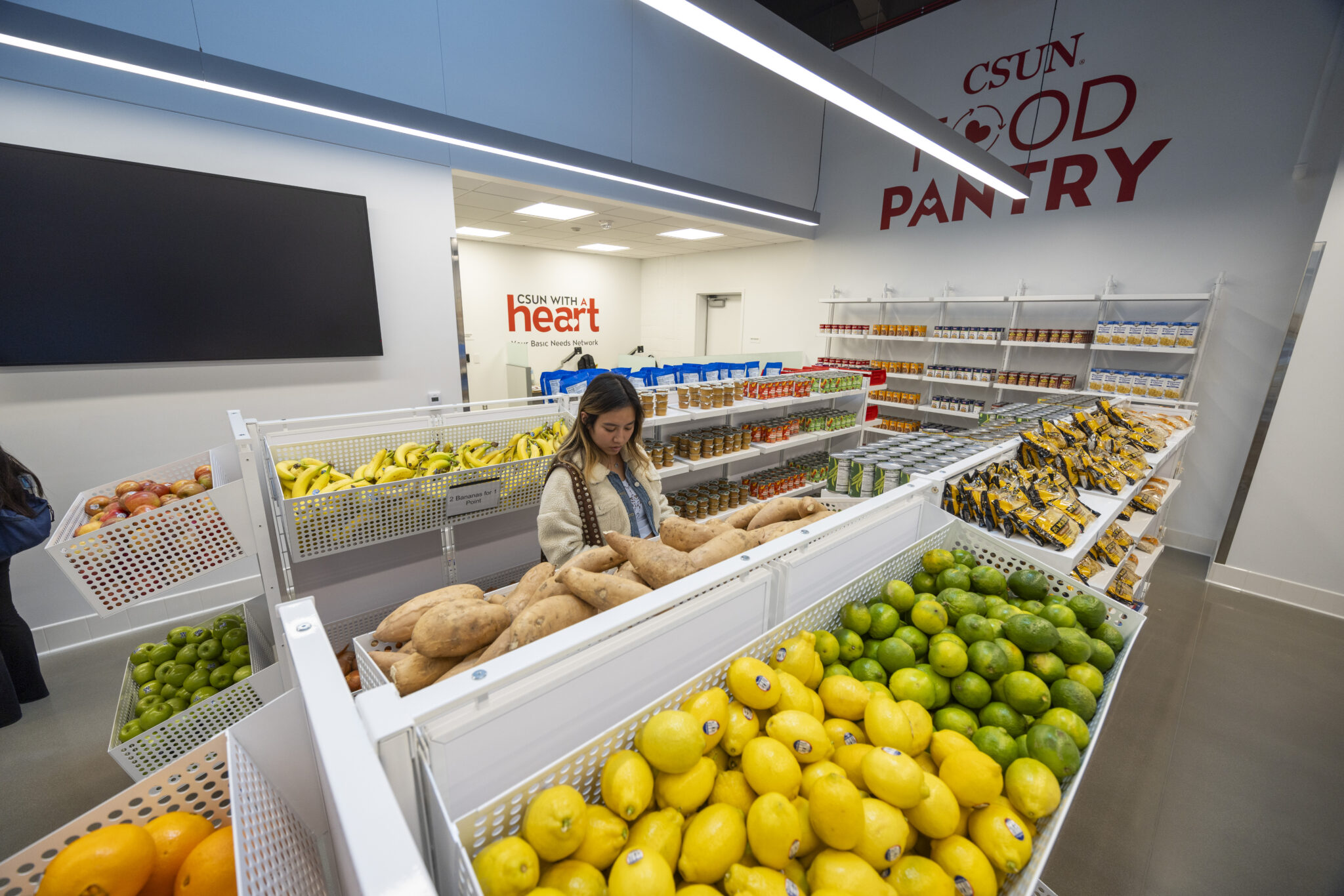 Student Audrey Gracia shops at CSUN Food Pantry at Valera Nest on California State University, Northridge  in Los Angeles, California, Wednesday, January 21, 2026. Photo by Ringo Chiu. 