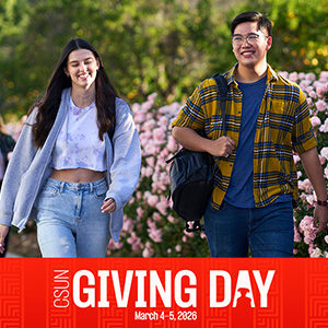Two students walk together by rose bushes. Red banner across the bottom of the photo says CSUN Giving Day, March 4-5, 2026.