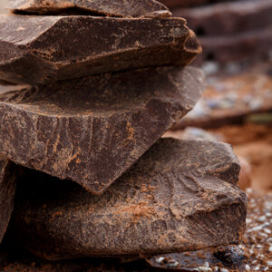 Cocoa mass and different types of chocolate bars. Organic artisan chocolate.