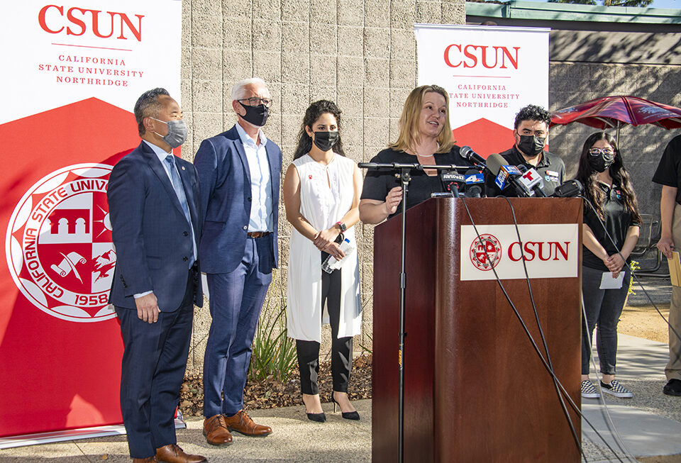 CSUN President Erika D. Beck announced the gift from The Change Reaction. Behind her, beginning on the left, are Los Angeles City Councilman John Lee, Wade Trimmer, president of The Change Reaction, Daniela Barcenas, manager of CSUN’s DREAM Center and students Irvin Rendon and Karen Castillo. Photo by Lee Choo.