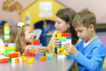 Children playing with legos. Image provided by Robin Sachs.