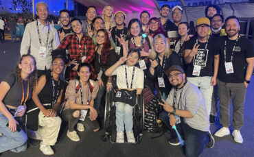 Above is a group photo of some of the IXLA creatives at the Adobe Max 2022 event. The team has partnered with a nonprofit to help unhoused community college students. Photo courtesy of IXLA.