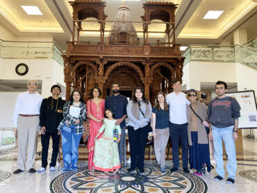 Vikas Malhotra, CSUN’s first Bhagvan Ajitnath Endowed Professorship in Jain Studies, his family (center left) and Dr. Jasvant Modi (far left) with CSUN students and their families doing a class visit to the Jain Center of Southern California. Photo courtesy of Vikas Malhotra.