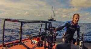 Peter Edmunds heading out to do research on the coral reefs of French Polynesia near Tahiti. Photo courtesy of Robert Carpenter.