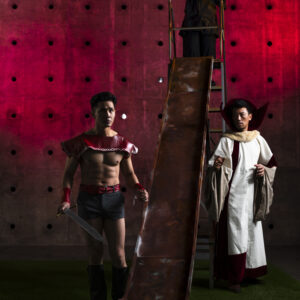 A shawdowy image from Bruce Yonemoto's Flash Gordon cosplay photo series.