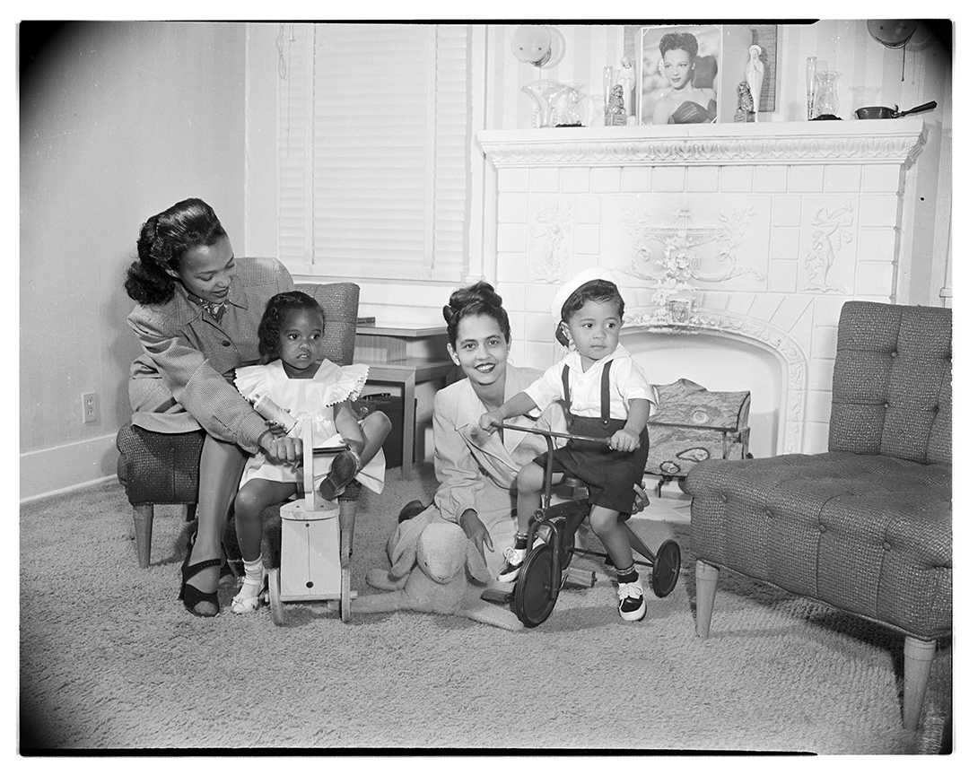Dorothy Dandridge and her daughter, Harolyn Suzanne, with Geraldine Pate and her son, Tony. Los Angeles, ca. 1946-1947. Photo by Vera Jackson. © CSUN Tom & Ethel Bradley Center.